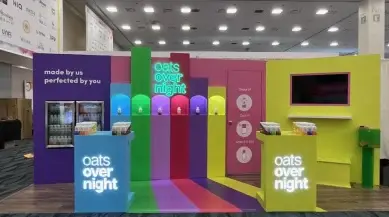 Impactful brand presence of Oats Overnight at a trade show booth designed by Highway 85 Productions
