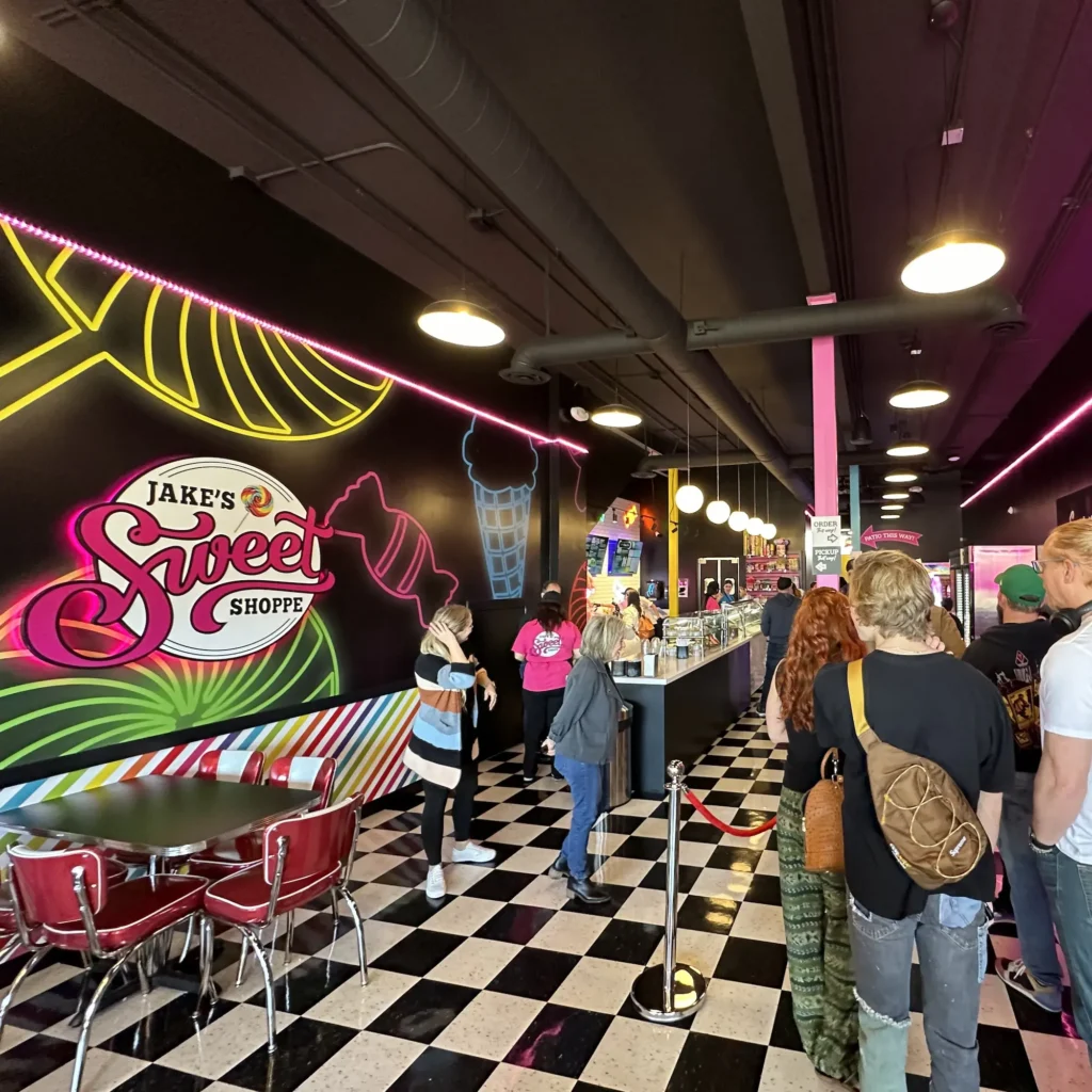 Community retail center interior by Highway 85 Creative