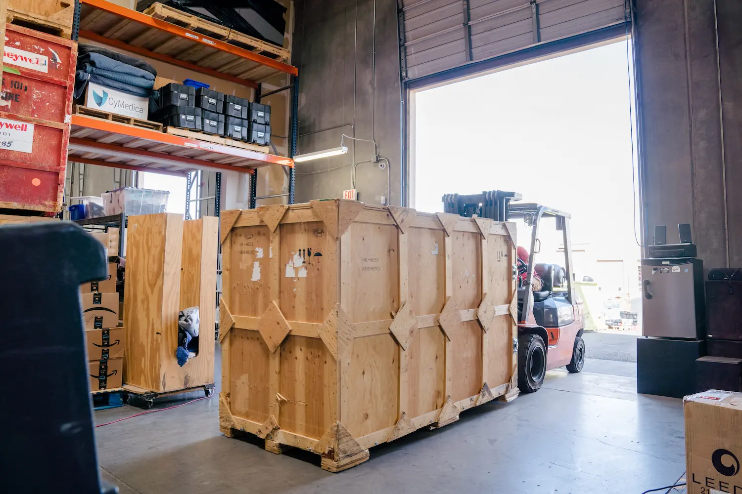 Custom trade show exhibit crates in warehouse ready for shipping