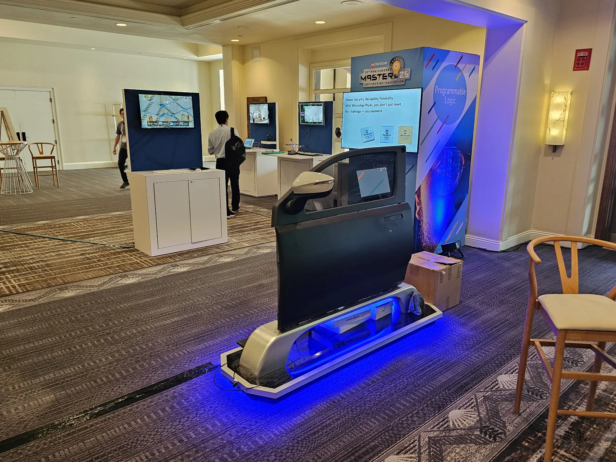 Microchip Masters 25th Anniversary corporate event success metrics on display through branded product demo stations and interactive exhibits produced by Highway 85 Productions