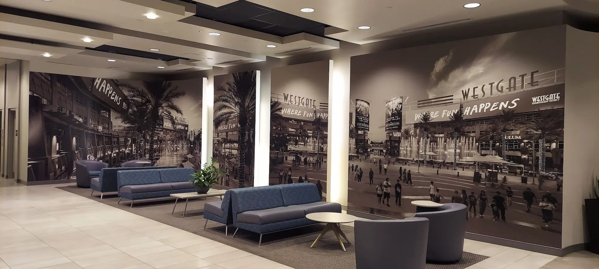Westgate Entertainment District office lobby with large format branded wall graphics and permanent interior installation by Highway 85 Productions
