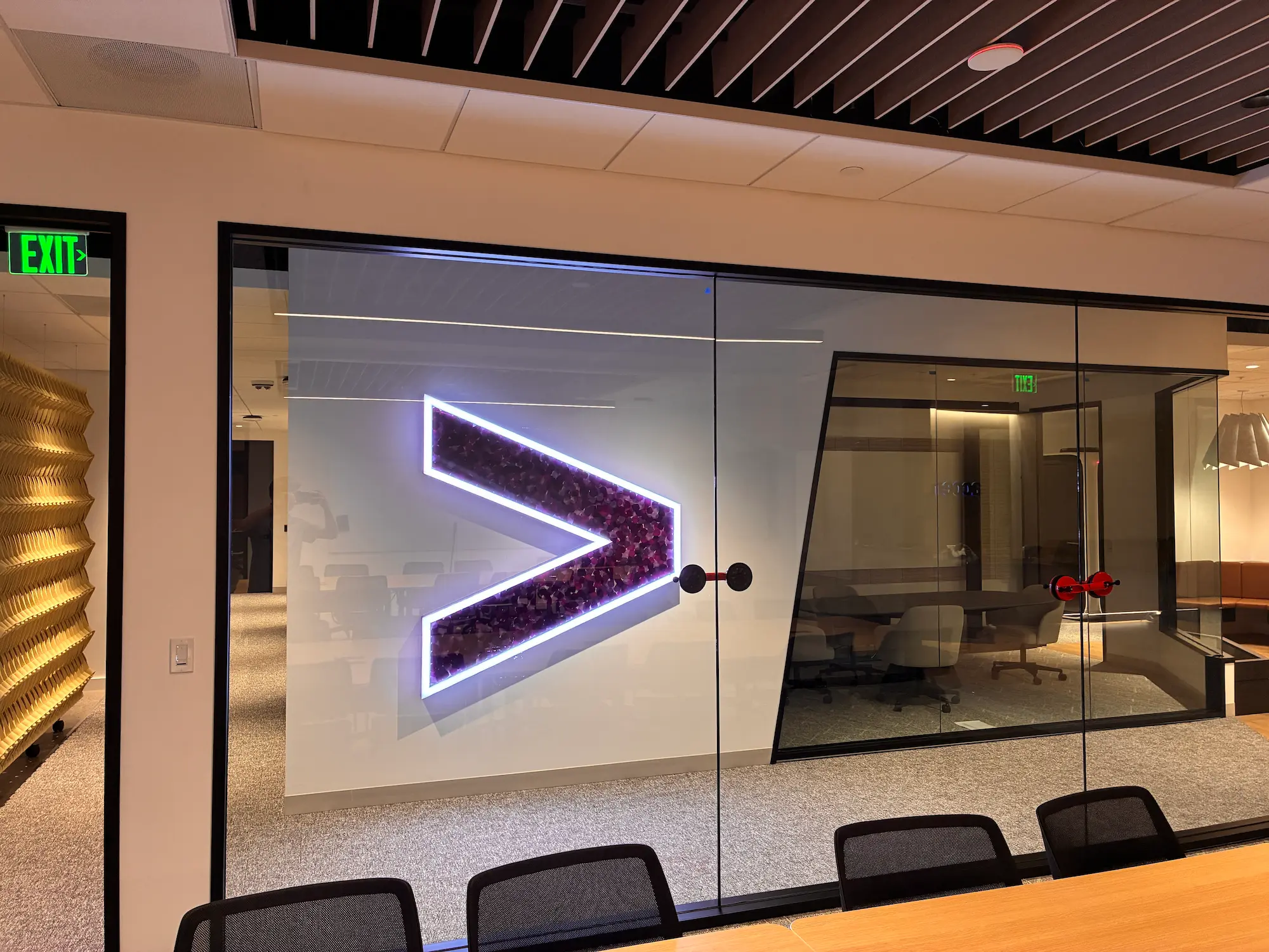 Accenture office commercial interior fabrication with custom illuminated branded logo installation and glass wall conference room by Highway 85 Productions