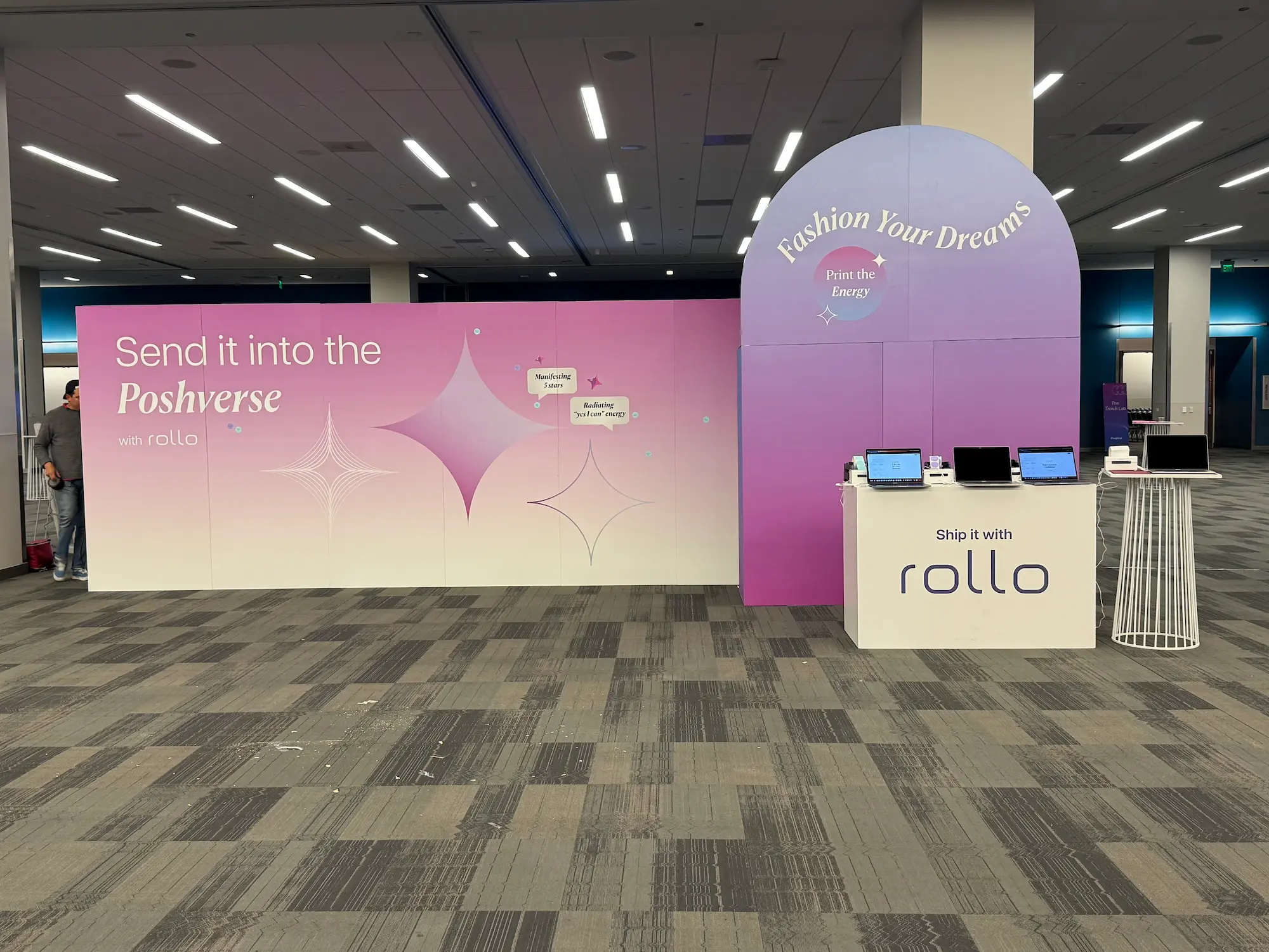 Award-winning fabricators created a pink and purple Rollo branded event display with dimensional walls, graphics, and shipping counter by Highway 85 Productions