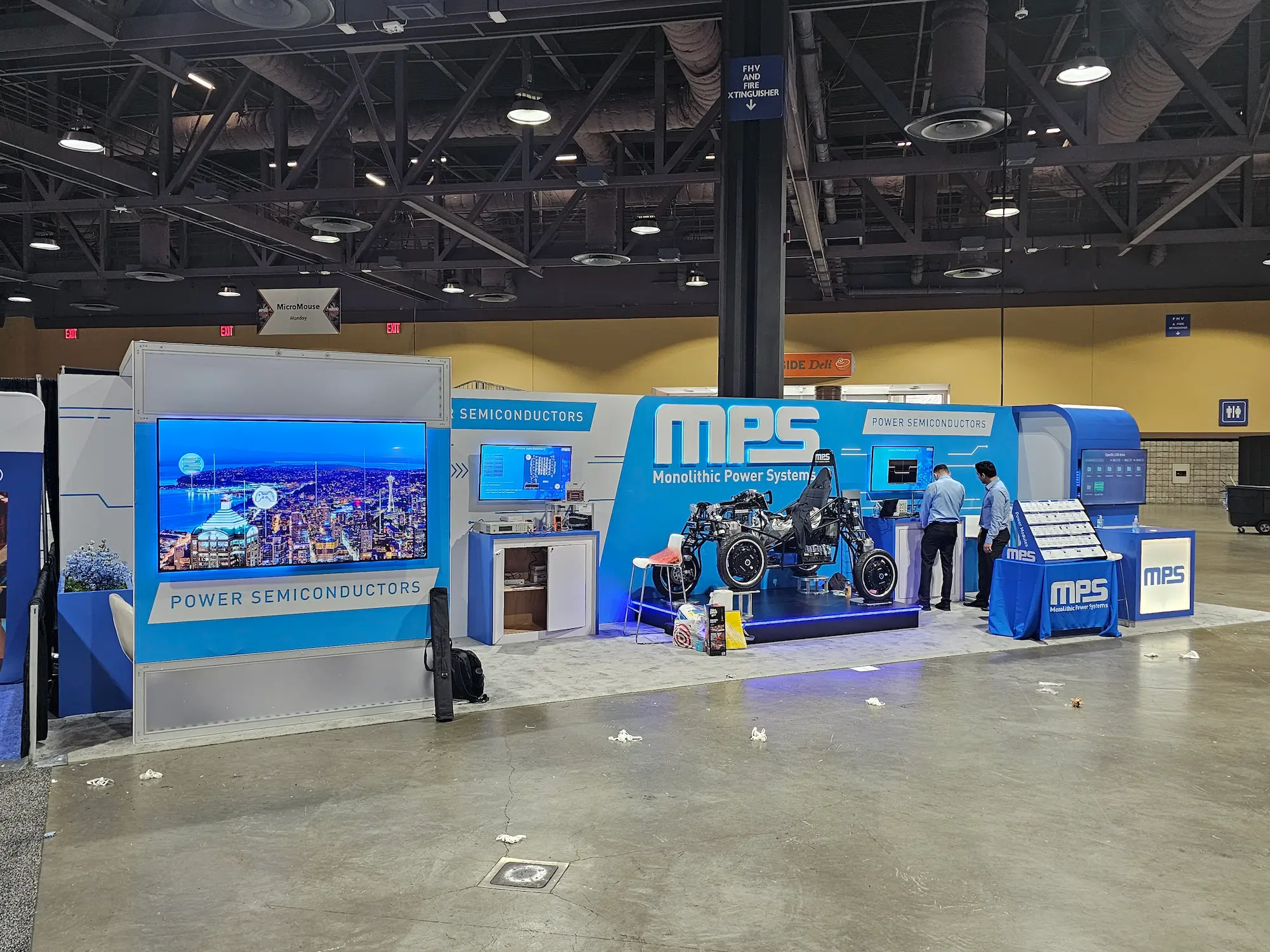 Monolithic Power Systems 10x30 trade show booth with custom fabricated branded structure and integrated product displays produced by Highway 85 Productions for an agency client