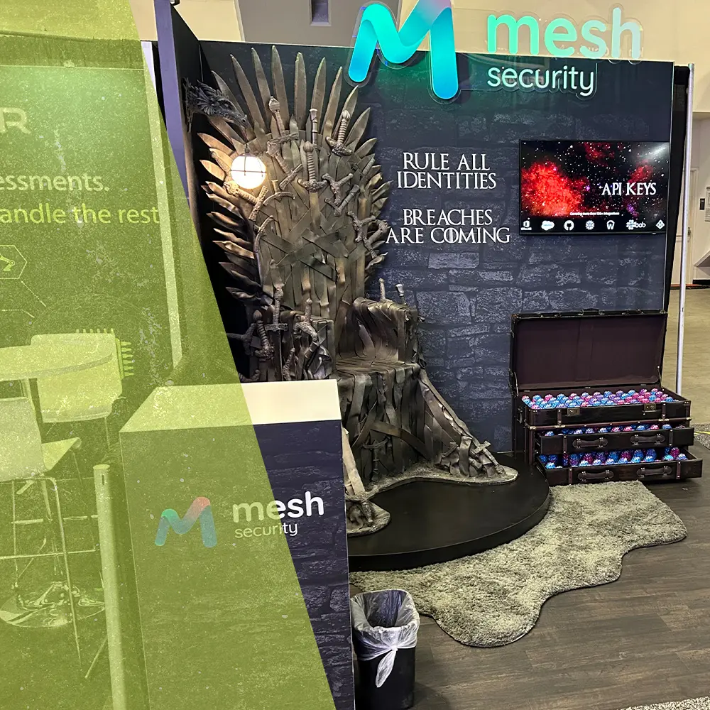 10x10 trade show booth featuring custom fabricated throne, counter, mounted led screen and dimensional logo on an acrylic sign