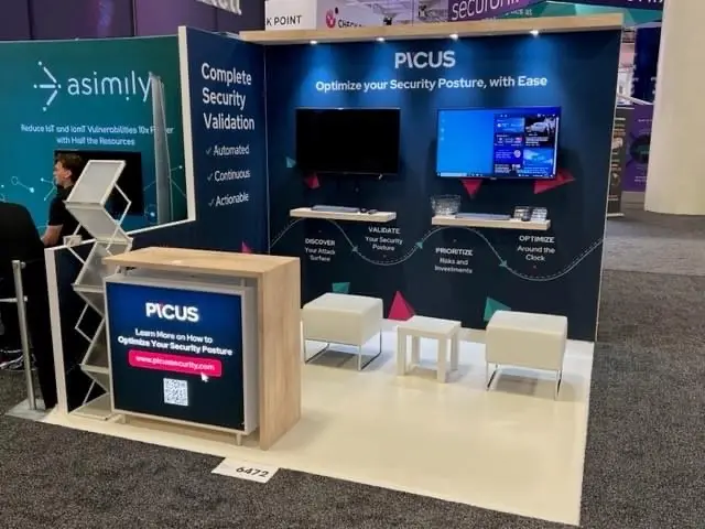 Picus custom 10x10 trade show booth representing the booth rental and fabrication portion of a first trade show cost budget by Highway 85 Productions