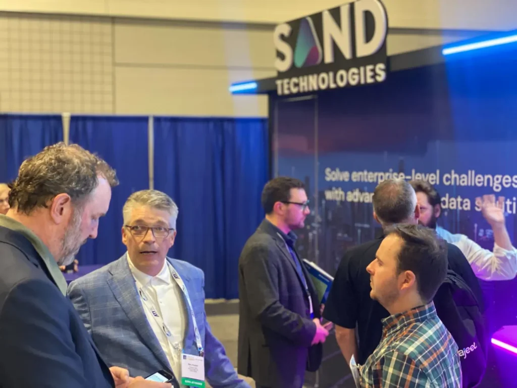 Sand Tech custom 10x20 trade show booth showing the fabrication and design costs that belong in a complete trade show budget approval package by Highway 85 Productions