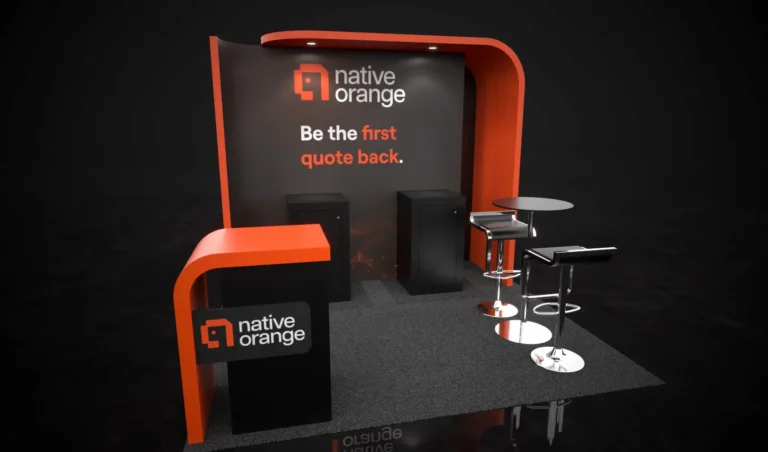 3D rendering of a 10x10 trade show booth for "Native Orange" featuring a curved orange and black back wall with the tagline "Be the first quote back," two dark storage cabinets, an illuminated reception counter with the Native Orange logo, high-top black bar tables with chrome barstools, and dark carpet flooring.