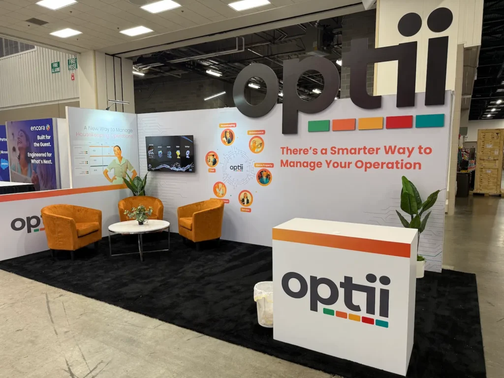 Optii custom 10x20 trade show booth showing how reusable design helps avoid trade show budget red flags like constant rebuilding by Highway 85 Productions