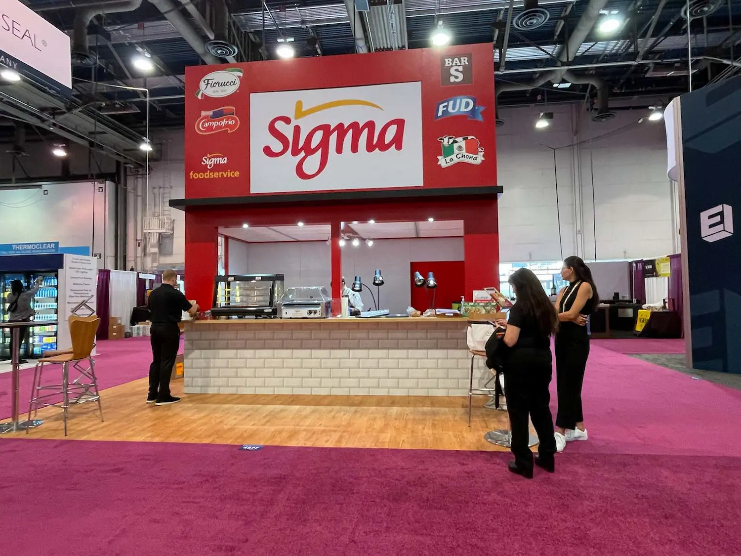Sigma custom 20x20 trade show booth showing the full program a trade show budget template needs to account for by Highway 85 Productions